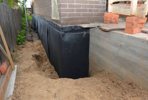 Happy homeowners after waterproofing job in Hillsborough